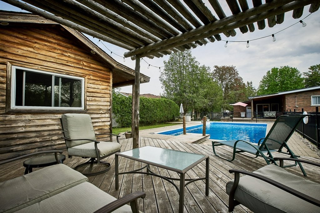 Backyard pool at a home for sale in Brooklin, Ontario